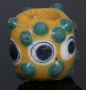Ancient yellow glass stratified eye bead with prunts
